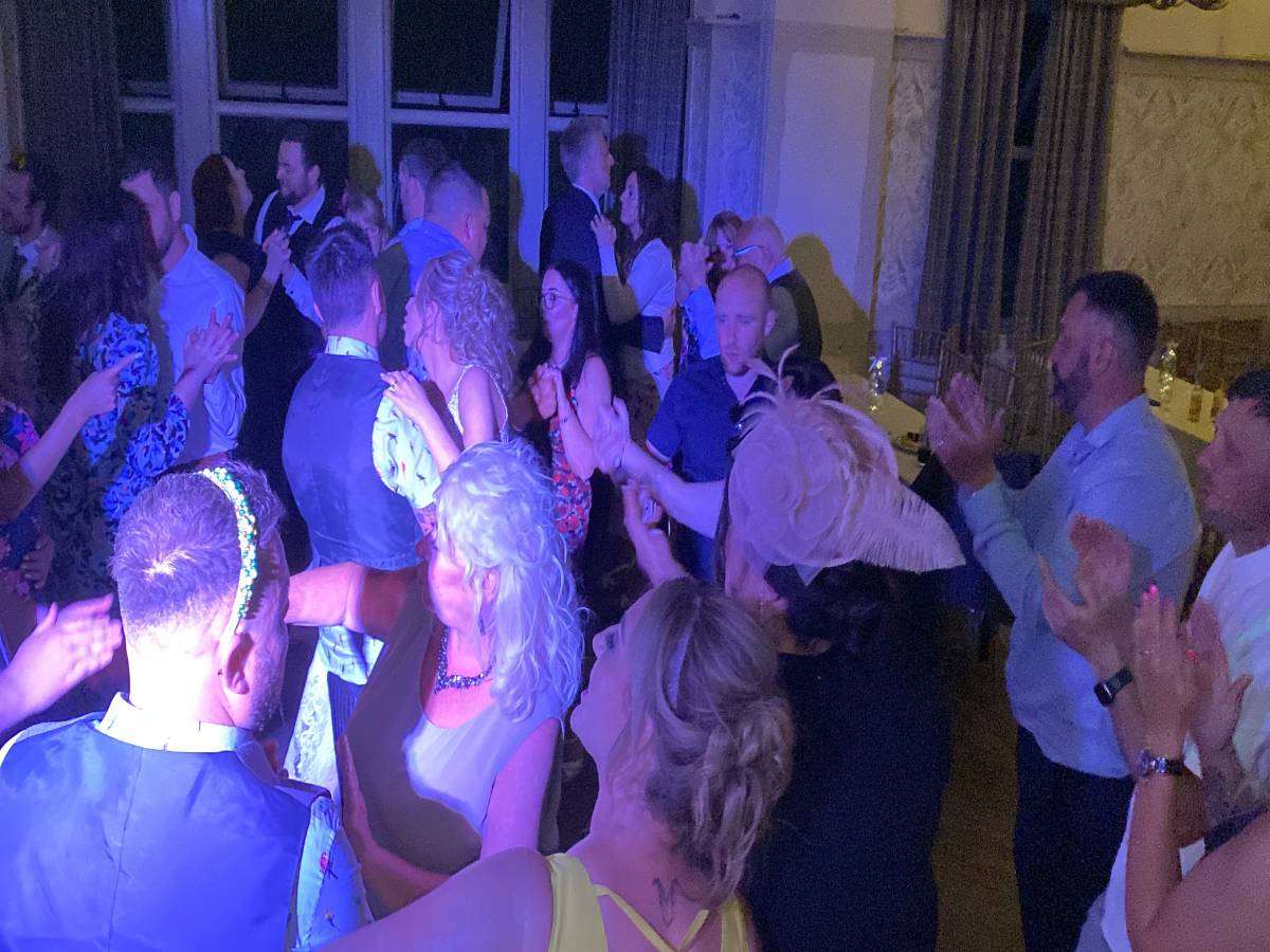 Picture of Robert Wilson working at a wedding